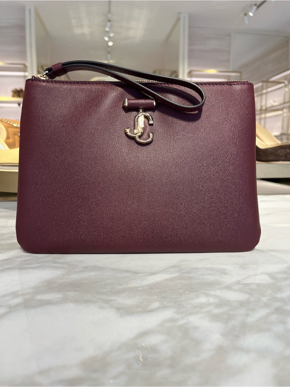Jimmy Choo Maroon Leather Wristlet with Gold JC Logo